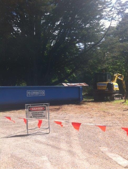 Removal of Asbestos from the soil with Excavator